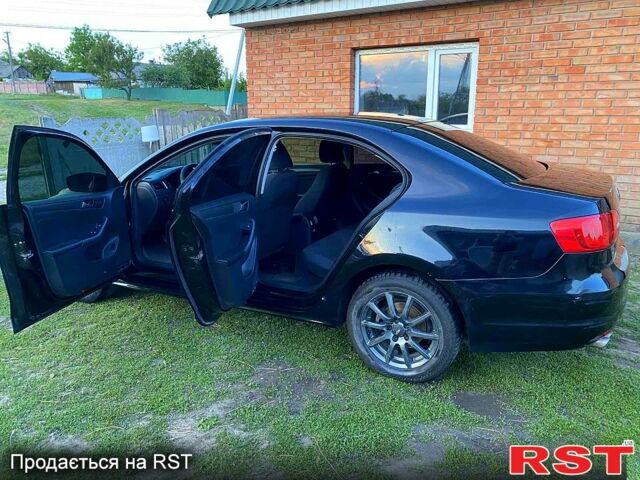 Черный Фольксваген Джетта, объемом двигателя 2 л и пробегом 200 тыс. км за 7999 $, фото 4 на Automoto.ua