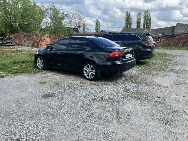 Чорний Фольксваген Джетта, об'ємом двигуна 2 л та пробігом 173 тис. км за 12500 $, фото 1 на Automoto.ua