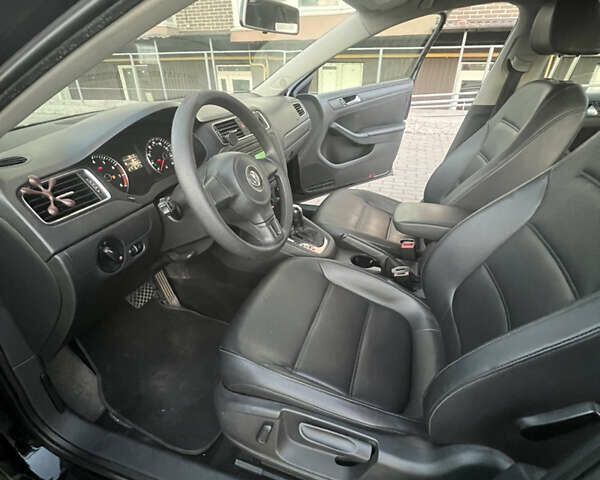 Фольксваген Джетта 2014 в Чернигове на Automoto.ua Черный Фольксваген Джетта, объемом двигателя 1.8 л и пробегом 192 тыс. км за 9500 $, фото 13 на Automoto.ua