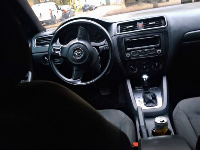 Фольксваген Джетта 2014 в Коростене на Automoto.ua Черный Фольксваген Джетта, объемом двигателя 2 л и пробегом 250 тыс. км за 8500 $, фото 7 на Automoto.ua