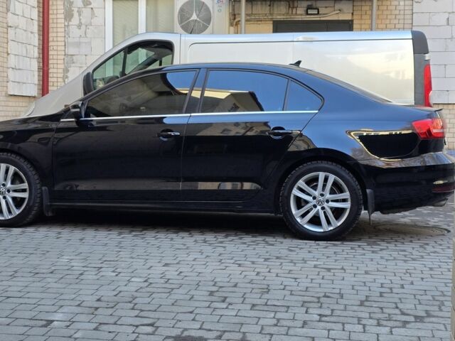 Чорний Фольксваген Джетта, об'ємом двигуна 2 л та пробігом 173 тис. км за 12500 $, фото 3 на Automoto.ua