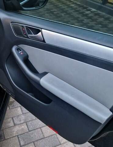 Чорний Фольксваген Джетта, об'ємом двигуна 1.4 л та пробігом 241 тис. км за 8599 $, фото 12 на Automoto.ua