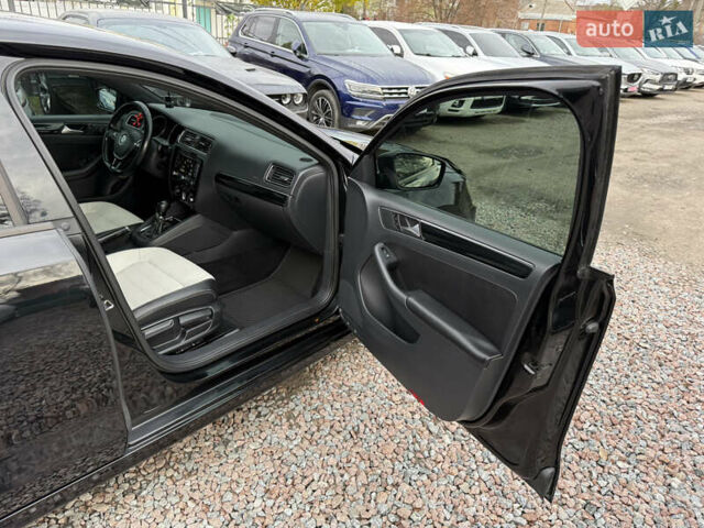 Чорний Фольксваген Джетта, об'ємом двигуна 1.8 л та пробігом 165 тис. км за 10999 $, фото 27 на Automoto.ua