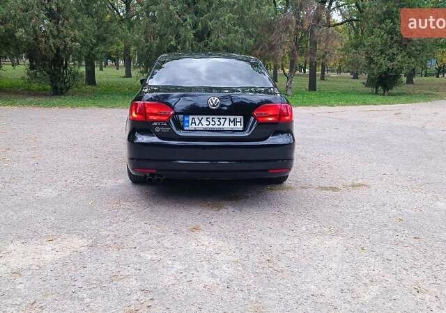 Фольксваген Джетта 2014 у Харкові на Automoto.ua Чорний Фольксваген Джетта, об'ємом двигуна 2 л та пробігом 151 тис. км за 9000 $, фото 12 на Automoto.ua