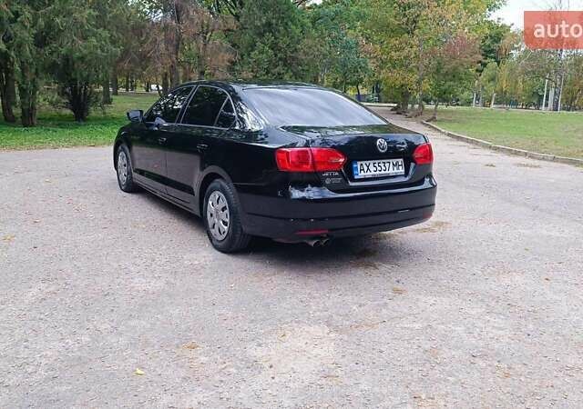 Фольксваген Джетта 2014 у Харкові на Automoto.ua Чорний Фольксваген Джетта, об'ємом двигуна 2 л та пробігом 151 тис. км за 9000 $, фото 10 на Automoto.ua