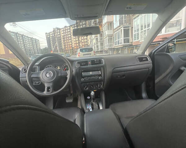 Фольксваген Джетта 2014 в Чернигове на Automoto.ua Черный Фольксваген Джетта, объемом двигателя 1.8 л и пробегом 192 тыс. км за 9500 $, фото 12 на Automoto.ua