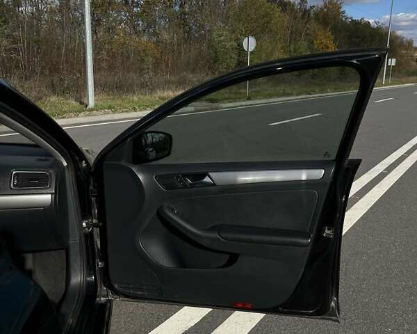 Фольксваген Джетта 2015 в Хмельницком на Automoto.ua Черный Фольксваген Джетта, объемом двигателя 1.8 л и пробегом 147 тыс. км за 9000 $, фото 14 на Automoto.ua