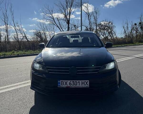 Фольксваген Джетта 2015 в Хмельницком на Automoto.ua Черный Фольксваген Джетта, объемом двигателя 1.8 л и пробегом 147 тыс. км за 9000 $, фото 4 на Automoto.ua