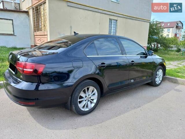 Черный Фольксваген Джетта, объемом двигателя 1.4 л и пробегом 180 тыс. км за 10500 $, фото 16 на Automoto.ua