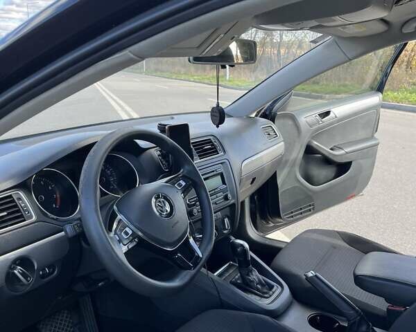 Фольксваген Джетта 2015 в Хмельницком на Automoto.ua Черный Фольксваген Джетта, объемом двигателя 1.8 л и пробегом 147 тыс. км за 9000 $, фото 21 на Automoto.ua