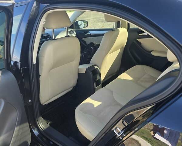 Черный Фольксваген Джетта, объемом двигателя 1.39 л и пробегом 160 тыс. км за 10600 $, фото 4 на Automoto.ua