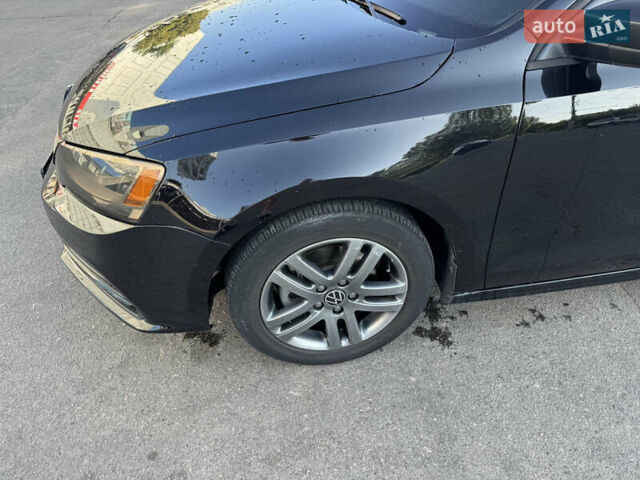 Черный Фольксваген Джетта, объемом двигателя 1.4 л и пробегом 123 тыс. км за 9600 $, фото 2 на Automoto.ua