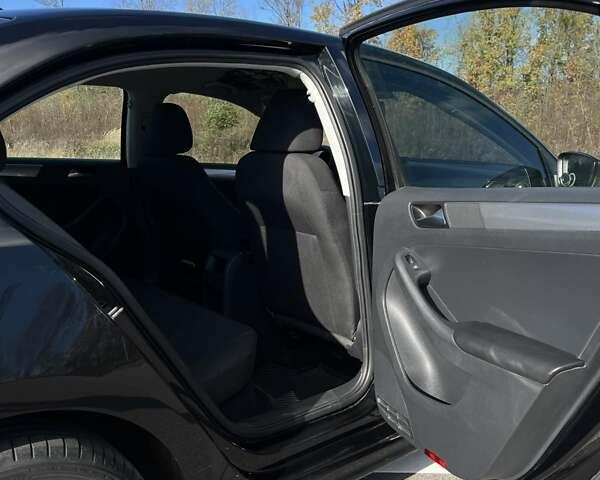 Фольксваген Джетта 2015 в Хмельницком на Automoto.ua Черный Фольксваген Джетта, объемом двигателя 1.8 л и пробегом 147 тыс. км за 9000 $, фото 3 на Automoto.ua