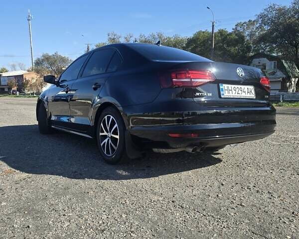 Черный Фольксваген Джетта, объемом двигателя 1.39 л и пробегом 160 тыс. км за 10600 $, фото 6 на Automoto.ua