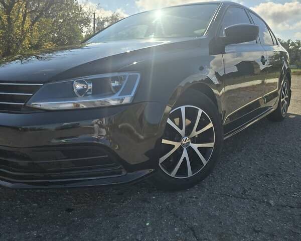 Черный Фольксваген Джетта, объемом двигателя 1.39 л и пробегом 160 тыс. км за 10600 $, фото 1 на Automoto.ua