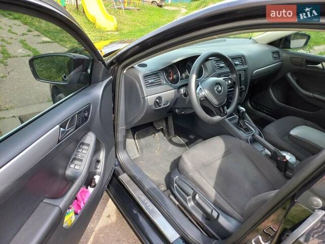 Черный Фольксваген Джетта, объемом двигателя 1.4 л и пробегом 180 тыс. км за 10500 $, фото 10 на Automoto.ua