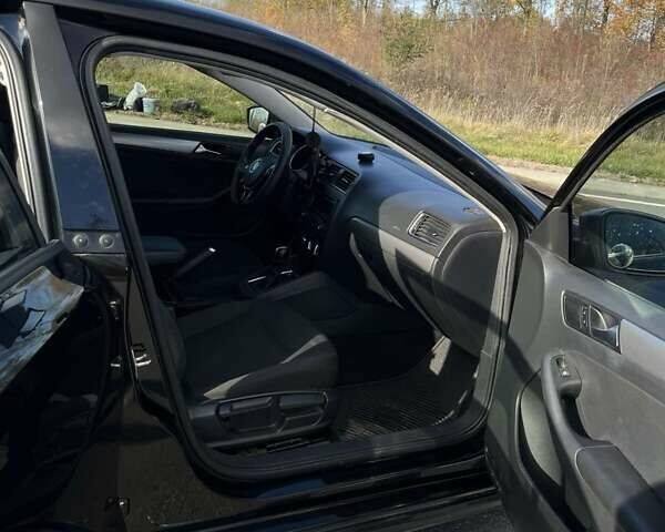 Фольксваген Джетта 2015 в Хмельницком на Automoto.ua Черный Фольксваген Джетта, объемом двигателя 1.8 л и пробегом 147 тыс. км за 9000 $, фото 15 на Automoto.ua