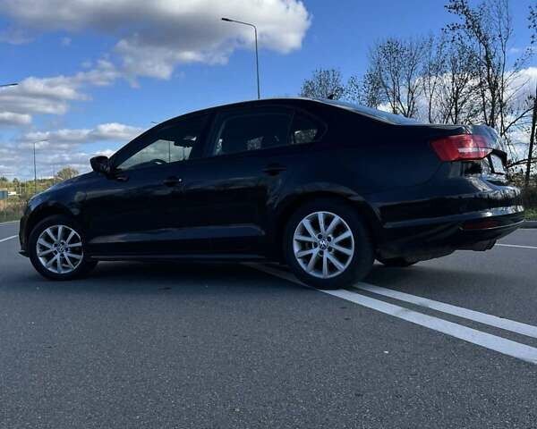 Фольксваген Джетта 2015 в Хмельницком на Automoto.ua Черный Фольксваген Джетта, объемом двигателя 1.8 л и пробегом 147 тыс. км за 9000 $, фото 8 на Automoto.ua