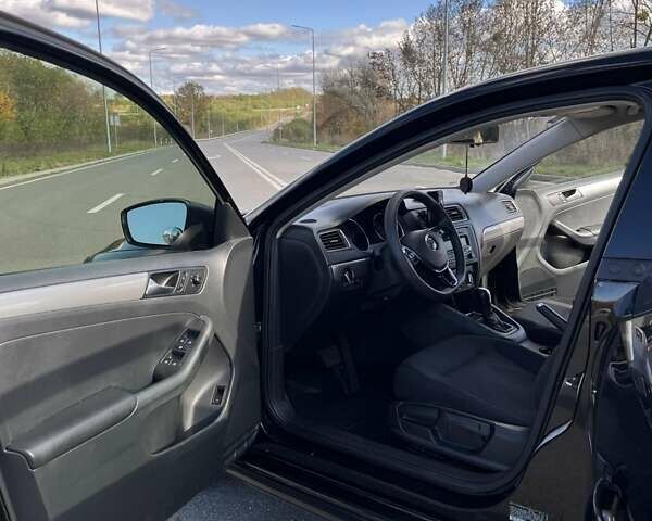 Фольксваген Джетта 2015 в Хмельницком на Automoto.ua Черный Фольксваген Джетта, объемом двигателя 1.8 л и пробегом 147 тыс. км за 9000 $, фото 16 на Automoto.ua