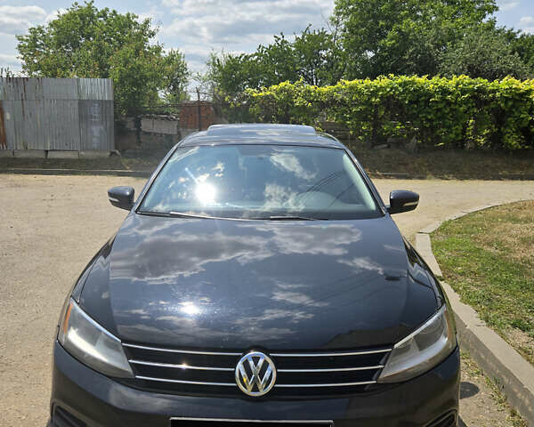 Черный Фольксваген Джетта, объемом двигателя 1.4 л и пробегом 180 тыс. км за 10500 $, фото 1 на Automoto.ua