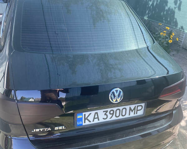 Чорний Фольксваген Джетта, об'ємом двигуна 1.39 л та пробігом 142 тис. км за 12000 $, фото 17 на Automoto.ua