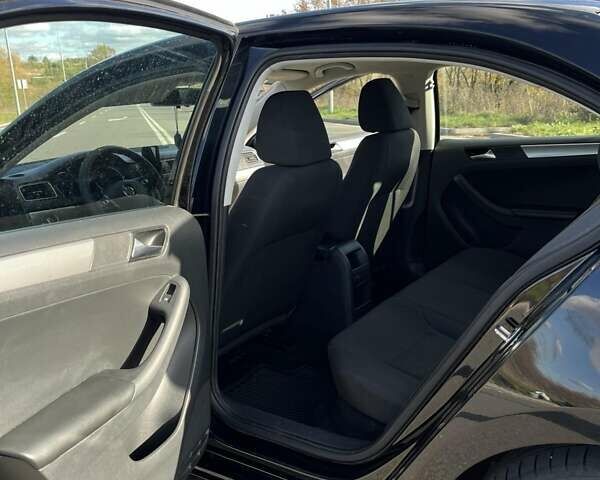 Фольксваген Джетта 2015 в Хмельницком на Automoto.ua Черный Фольксваген Джетта, объемом двигателя 1.8 л и пробегом 147 тыс. км за 9000 $, фото 19 на Automoto.ua