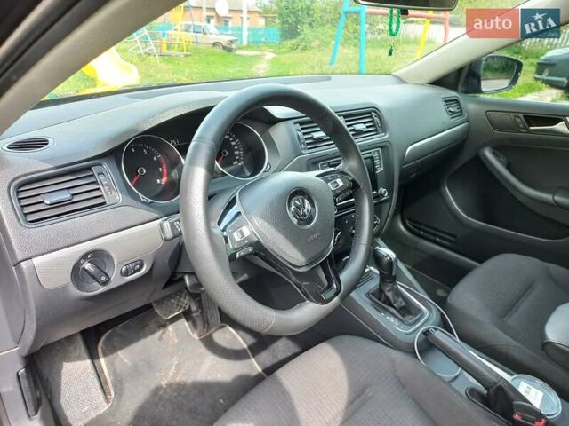 Черный Фольксваген Джетта, объемом двигателя 1.4 л и пробегом 180 тыс. км за 10500 $, фото 9 на Automoto.ua