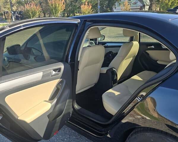 Черный Фольксваген Джетта, объемом двигателя 1.39 л и пробегом 160 тыс. км за 10600 $, фото 5 на Automoto.ua