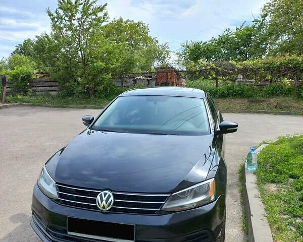 Черный Фольксваген Джетта, объемом двигателя 1.4 л и пробегом 180 тыс. км за 10500 $, фото 12 на Automoto.ua