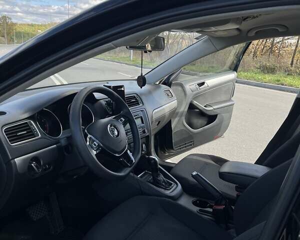 Фольксваген Джетта 2015 в Хмельницком на Automoto.ua Черный Фольксваген Джетта, объемом двигателя 1.8 л и пробегом 147 тыс. км за 9000 $, фото 13 на Automoto.ua