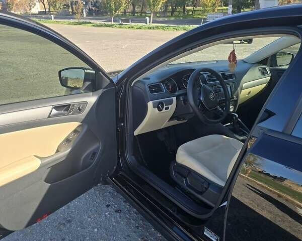 Черный Фольксваген Джетта, объемом двигателя 1.39 л и пробегом 160 тыс. км за 10600 $, фото 10 на Automoto.ua