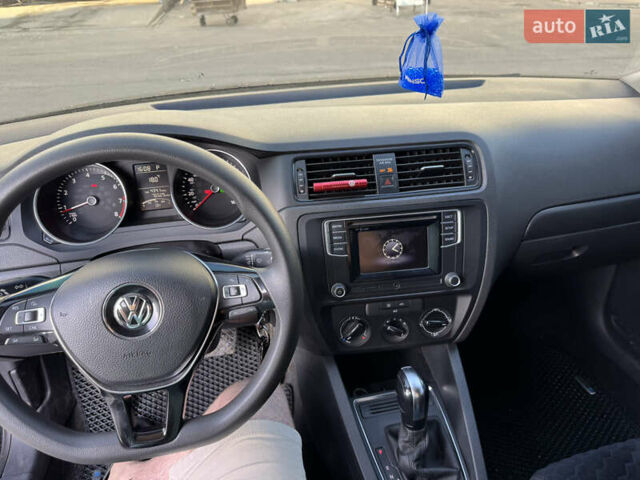 Черный Фольксваген Джетта, объемом двигателя 1.4 л и пробегом 123 тыс. км за 9600 $, фото 7 на Automoto.ua