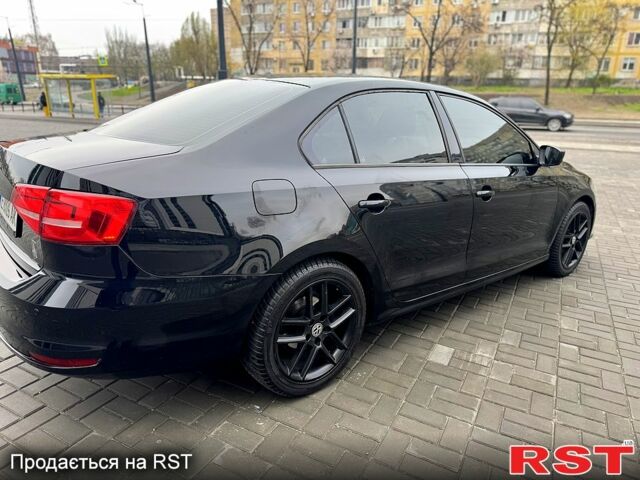 Фольксваген Джетта 2015 у Дніпро (Дніпропетровську) на Automoto.ua Чорний Фольксваген Джетта, об'ємом двигуна 2 л та пробігом 160 тис. км за 10999 $, фото 5 на Automoto.ua