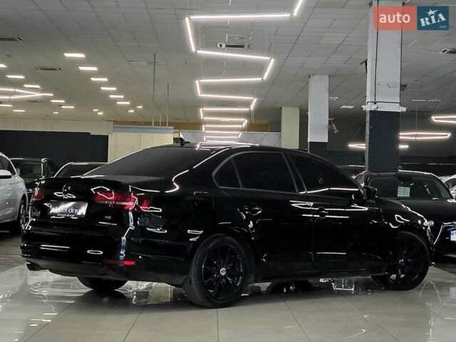 Черный Фольксваген Джетта, объемом двигателя 1.8 л и пробегом 202 тыс. км за 10999 $, фото 4 на Automoto.ua