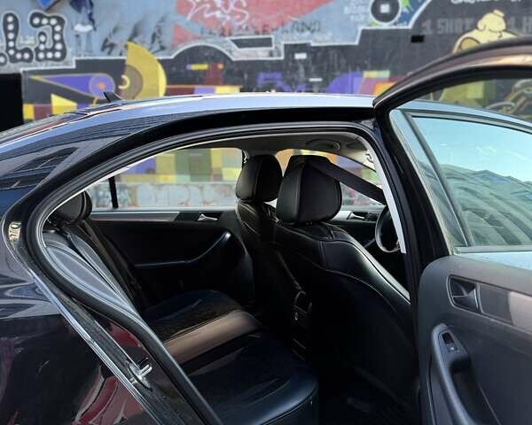 Черный Фольксваген Джетта, объемом двигателя 1.8 л и пробегом 90 тыс. км за 10500 $, фото 7 на Automoto.ua