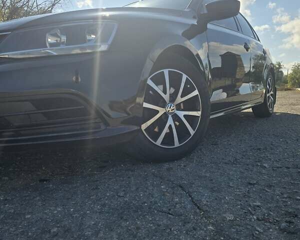 Черный Фольксваген Джетта, объемом двигателя 1.39 л и пробегом 160 тыс. км за 10600 $, фото 15 на Automoto.ua