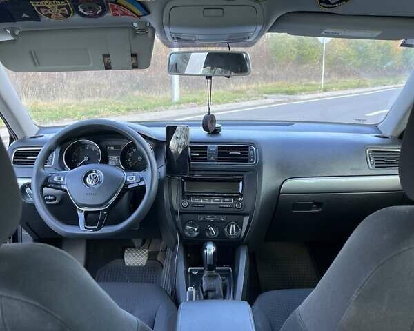 Фольксваген Джетта 2015 в Хмельницком на Automoto.ua Черный Фольксваген Джетта, объемом двигателя 1.8 л и пробегом 147 тыс. км за 9000 $, фото 2 на Automoto.ua