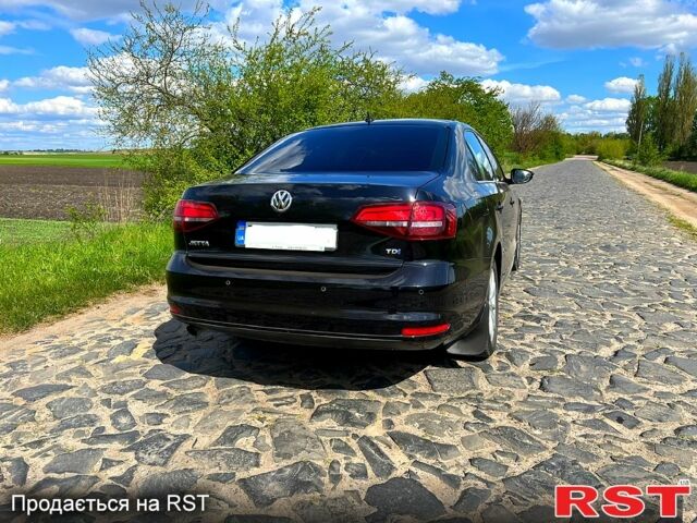 Чорний Фольксваген Джетта, об'ємом двигуна 1.6 л та пробігом 165 тис. км за 10900 $, фото 2 на Automoto.ua