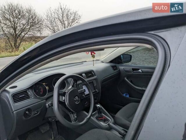 Чорний Фольксваген Джетта, об'ємом двигуна 1.4 л та пробігом 85 тис. км за 9850 $, фото 2 на Automoto.ua