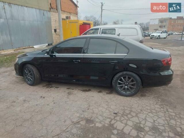 Чорний Фольксваген Джетта, об'ємом двигуна 1.4 л та пробігом 102 тис. км за 11700 $, фото 9 на Automoto.ua