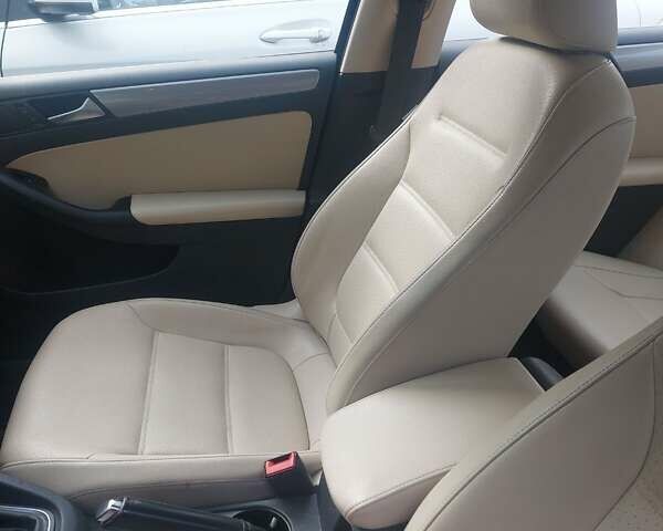 Чорний Фольксваген Джетта, об'ємом двигуна 1.4 л та пробігом 105 тис. км за 10673 $, фото 1 на Automoto.ua