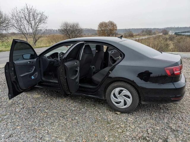 Черный Фольксваген Джетта, объемом двигателя 1.4 л и пробегом 85 тыс. км за 10500 $, фото 5 на Automoto.ua