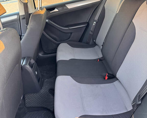 Чорний Фольксваген Джетта, об'ємом двигуна 1.4 л та пробігом 149 тис. км за 9700 $, фото 22 на Automoto.ua