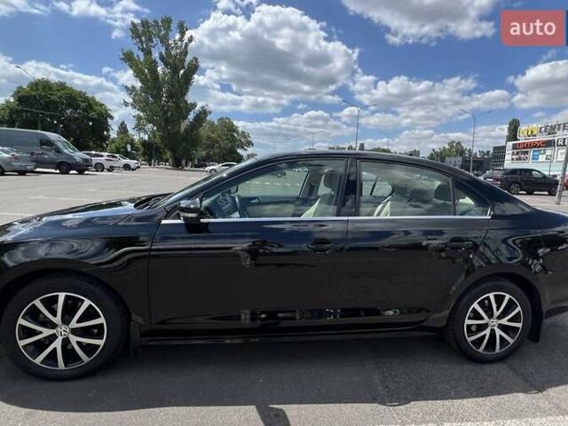 Чорний Фольксваген Джетта, об'ємом двигуна 1.4 л та пробігом 142 тис. км за 10500 $, фото 1 на Automoto.ua