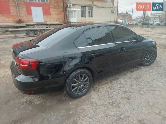 Чорний Фольксваген Джетта, об'ємом двигуна 1.4 л та пробігом 102 тис. км за 11700 $, фото 4 на Automoto.ua