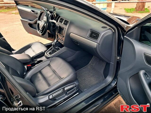 Черный Фольксваген Джетта, объемом двигателя 1.4 л и пробегом 140 тыс. км за 9500 $, фото 11 на Automoto.ua