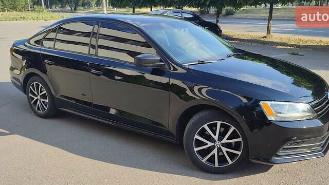 Черный Фольксваген Джетта, объемом двигателя 1.4 л и пробегом 147 тыс. км за 12000 $, фото 4 на Automoto.ua