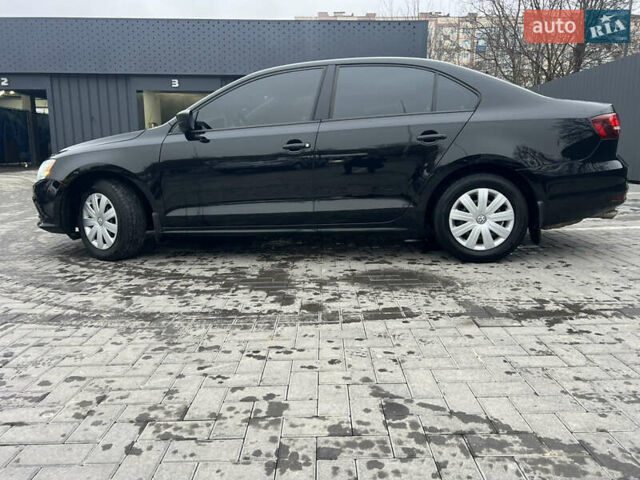Чорний Фольксваген Джетта, об'ємом двигуна 1.4 л та пробігом 105 тис. км за 10999 $, фото 5 на Automoto.ua