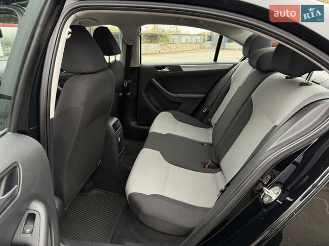 Черный Фольксваген Джетта, объемом двигателя 1.4 л и пробегом 139 тыс. км за 10800 $, фото 25 на Automoto.ua