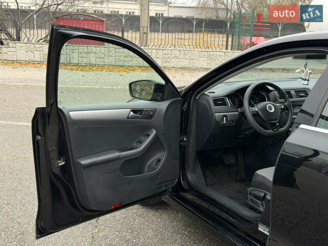 Черный Фольксваген Джетта, объемом двигателя 1.4 л и пробегом 139 тыс. км за 10800 $, фото 20 на Automoto.ua